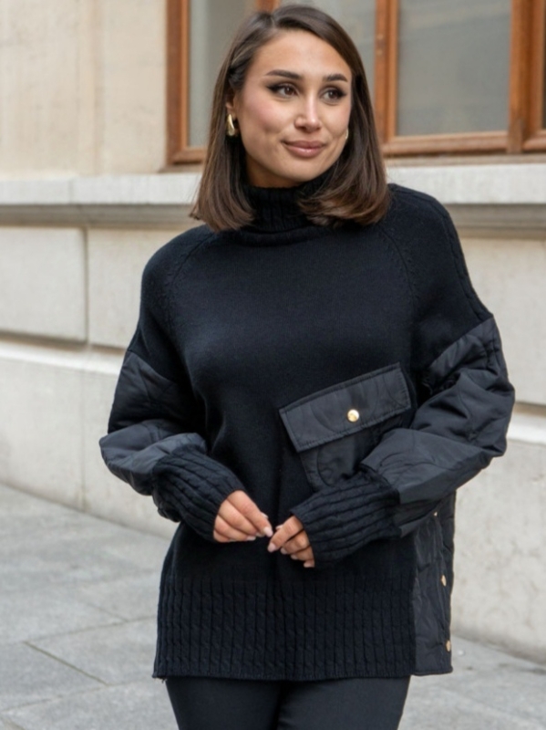 Women's sweater in black with a pocket