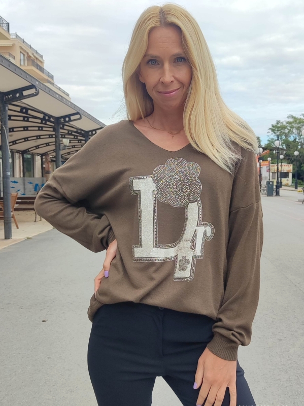 Women's sweater with V-neck and decorative accent