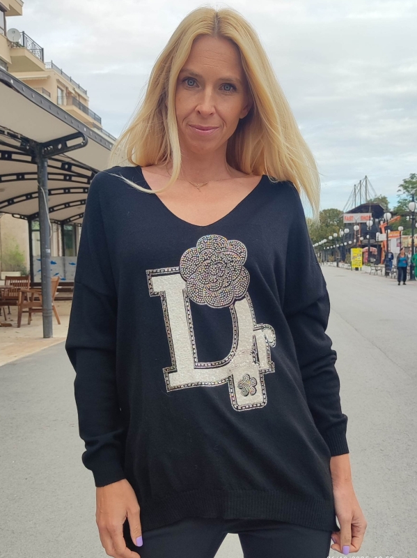 Women's sweater with V-neck and decorative accent