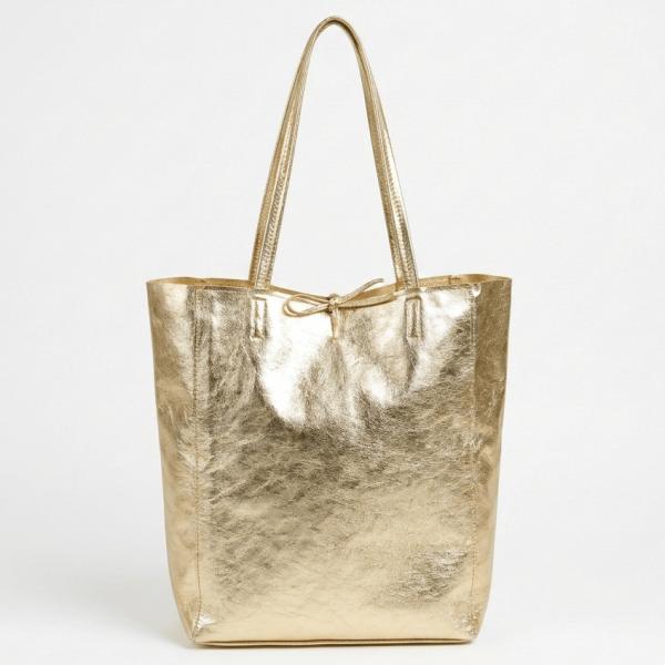 Лице на италианска златна дамска чанта тип торба