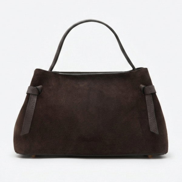 Елегантна тъмно кафява дамска чанта от естествен велур с къса дръжка, произведена в Италия.