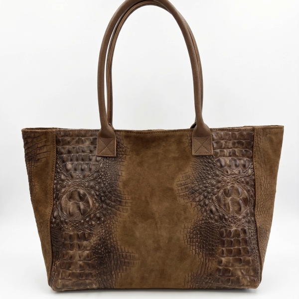 Front view of a cognac-colored shopper bag, combining suede in the center and crocodile-embossed leather on the sides.