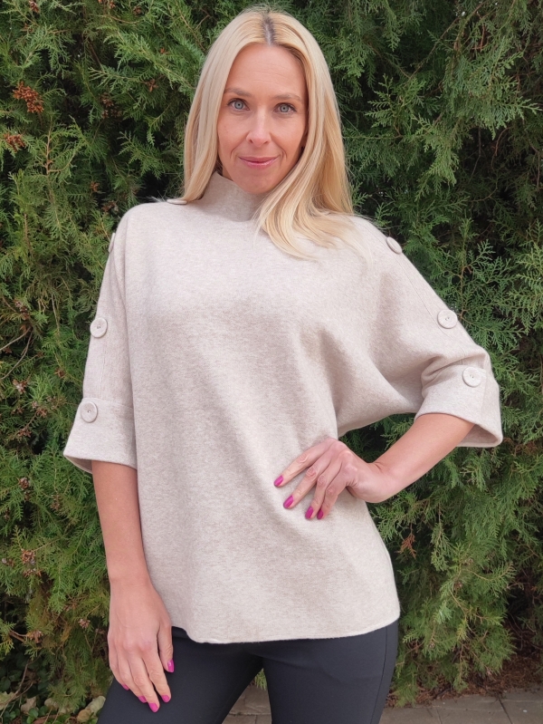 Women's blouse in beige with buttons and short sleeves