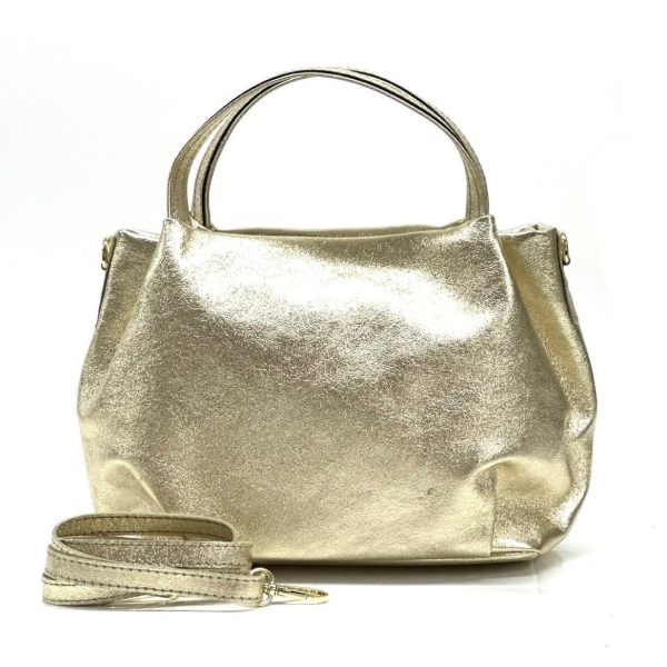 Handbag made of natural leather in  gold