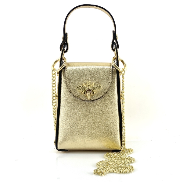 Small handbag made of genuine leather in gold