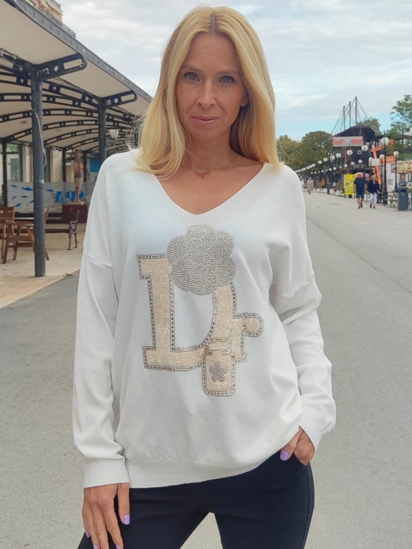 Women's sweater with V-neck and decorative accent