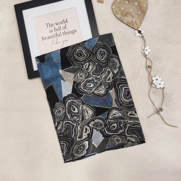 Luxurious women's scarf with artistic pattern in blue