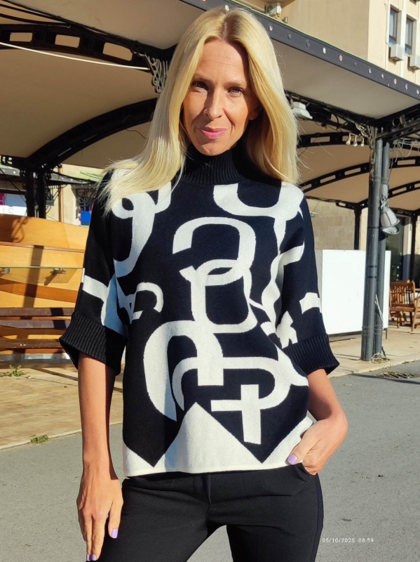 Women's black and white sweater with buttons - stylish autumn look