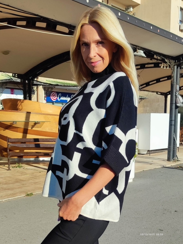 Women's black and white sweater with buttons - stylish autumn look