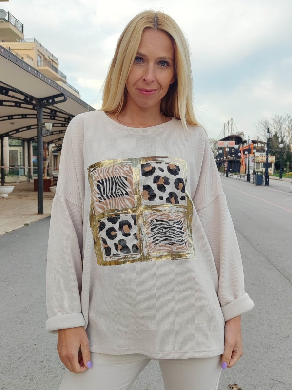 Women's beige sweater with animal print and gold accents - style and comfort
