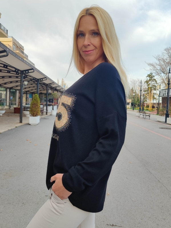 Women's sweater with V-neck and decorative accent