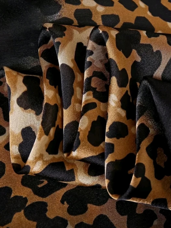 Elegant women's satin scarf with leopard print and black border from Unique Fashion Online