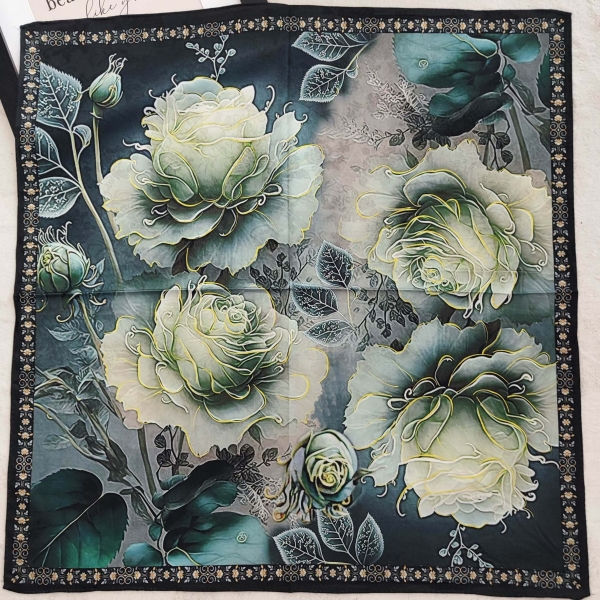 An unfolded square women's scarf 70x70 cm, showing the blue-green face with a floral rose motif and a fine decorative edge.