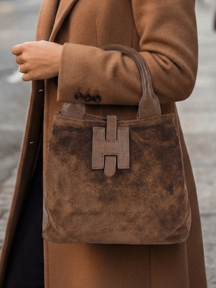 Small brown 2-in-1 handbag made of genuine leather and suede