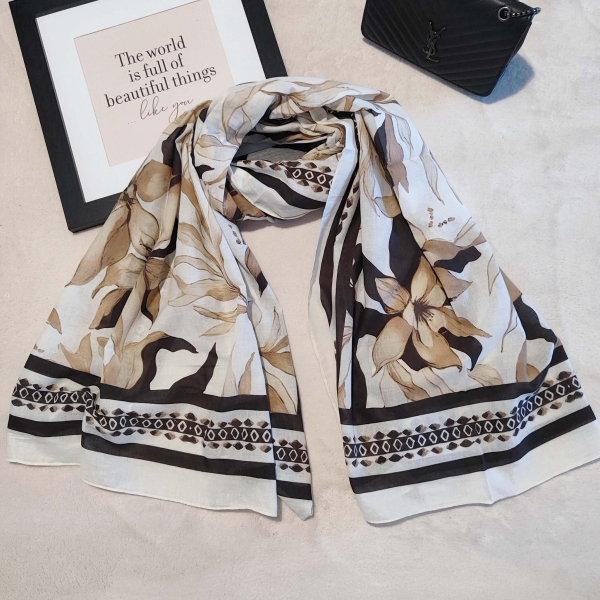 Elegant women's cotton scarf in beige and brown with a beautiful leaf motif, suitable for spring and summer