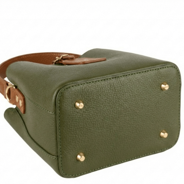 Metal feet on the bottom of a green leather bag