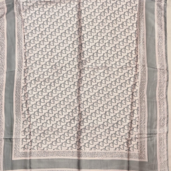 Unfolded satin silk scarf with a gray monogram, pink outline and gray textured border showing the entire print and size 190x90.