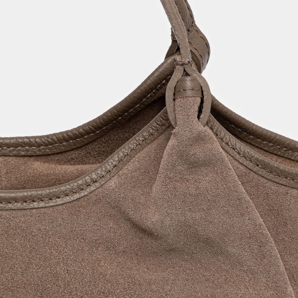 Detail of natural taupe suede on an Italian bag