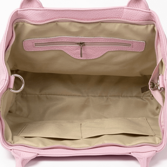 Interior layout of an Italian handbag with textile lining, inner zip pocket and phone compartments.