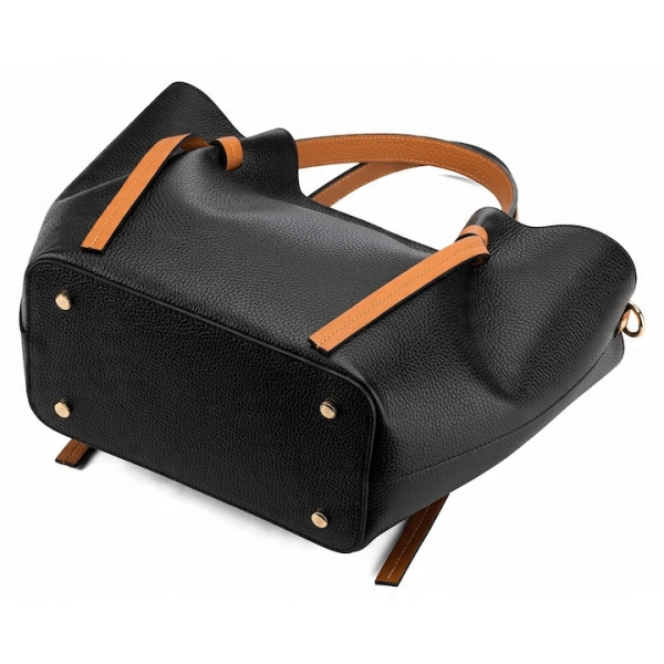 Bottom of a leather bag with protective metal feet, Italian quality