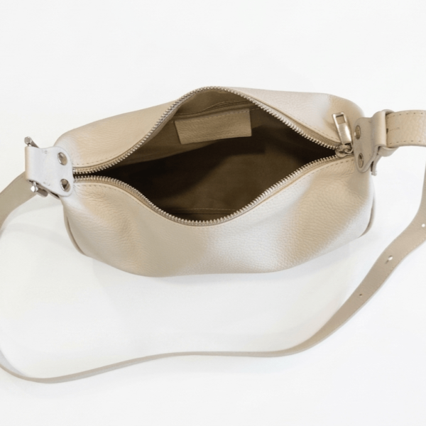 Internal compartment and zip pocket on a genuine leather handbag