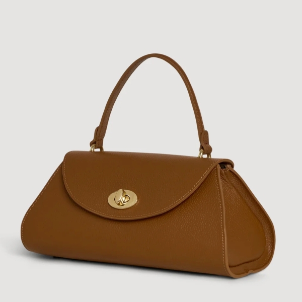 Front view of an Italian Siena genuine leather handbag in cognac color with gold metal elements and a closed lid.