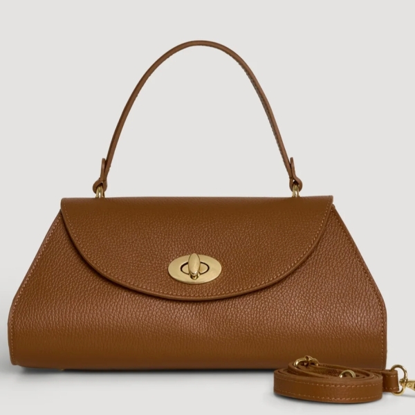 Luxurious women's handbag made of genuine Vera Pelle leather with an elegant trapezoidal shape, short handle and gold hardware.