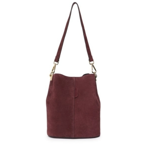 Women's bag made of genuine Italian burgundy suede with a long, adjustable shoulder strap.