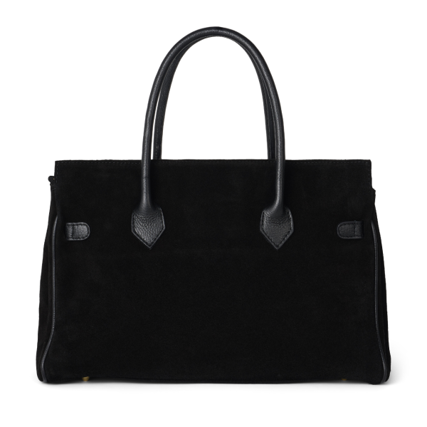 Black women's work bag, natural materials, clean design, Upper East Side style.