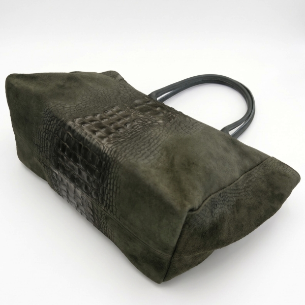 Wide base of a soft women's bag in olive green