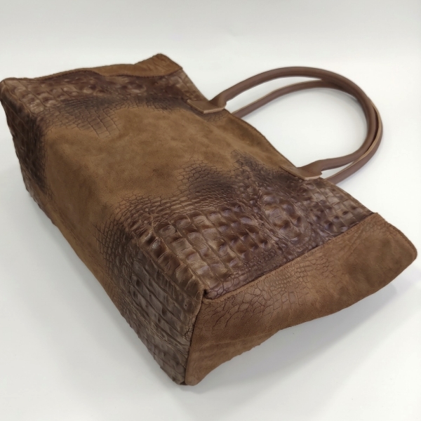 : Wide suede bottom of a soft Italian bag with leather details