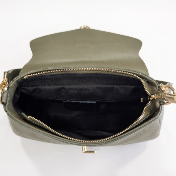 Interior layout of a khaki-colored leather bag, featuring a single compartment and a zippered pocket.