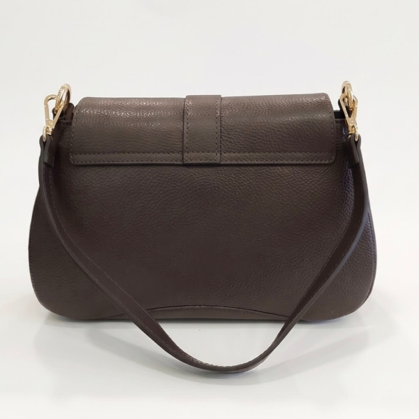 Rear view of a dark chocolate-colored women's handbag, showing the high-quality texture of the genuine leather and the metal rings.