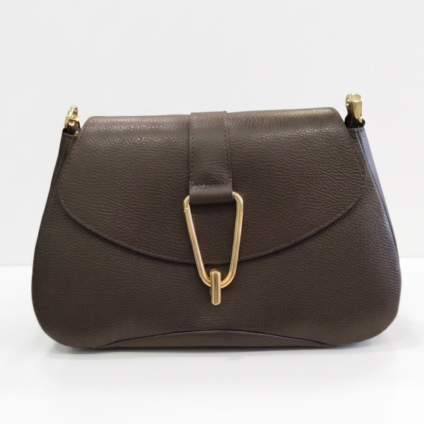 Front view of an elegant women's handbag made of genuine leather in a trendy dark brown color.
