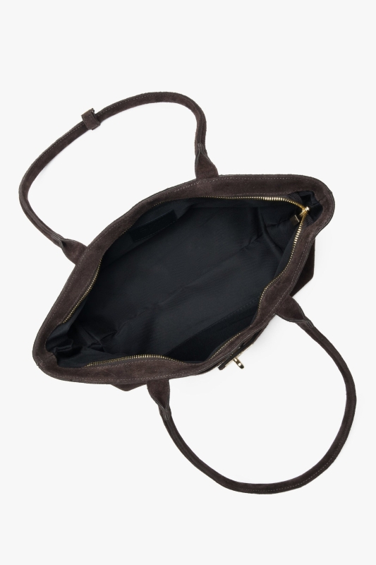 Interior layout of a women's suede bag, featuring a main compartment and an internal zippered pocket.